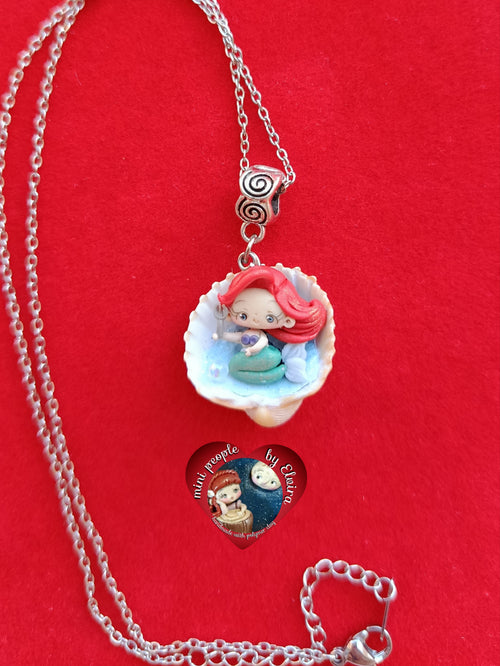 Collana Ariel in conchiglia con arricciaspiccia
